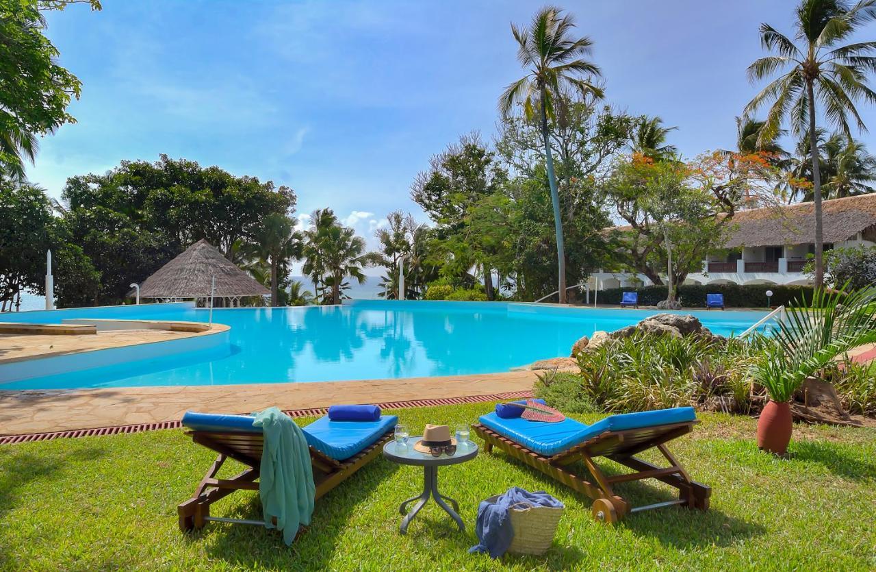 Diamonds Leisure Beach & Golf Resort Diani Beach Exterior photo The pool at the Serena Beach Resort
