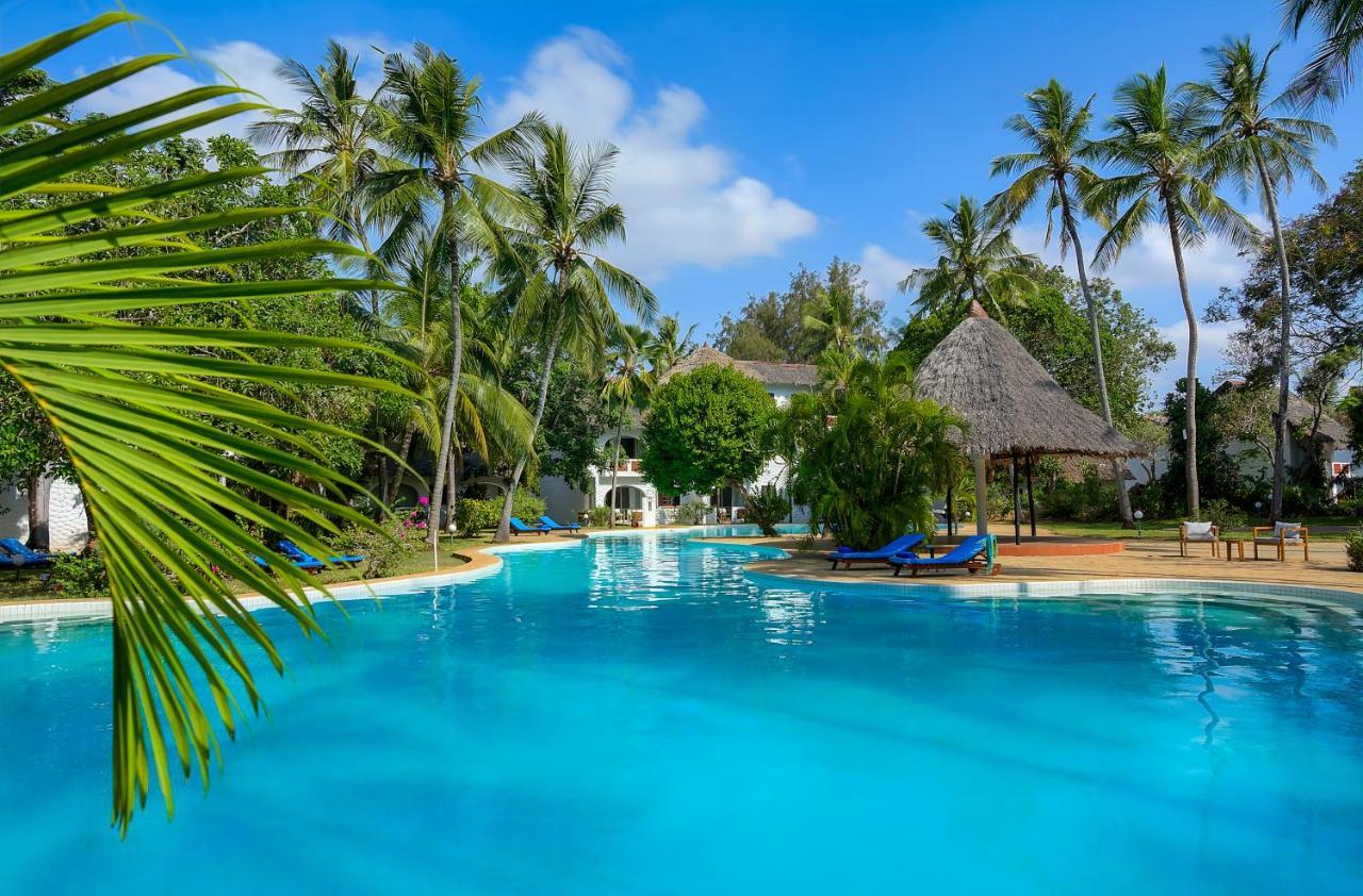 Diamonds Leisure Beach & Golf Resort Diani Beach Exterior photo The swimming pool at the hotel