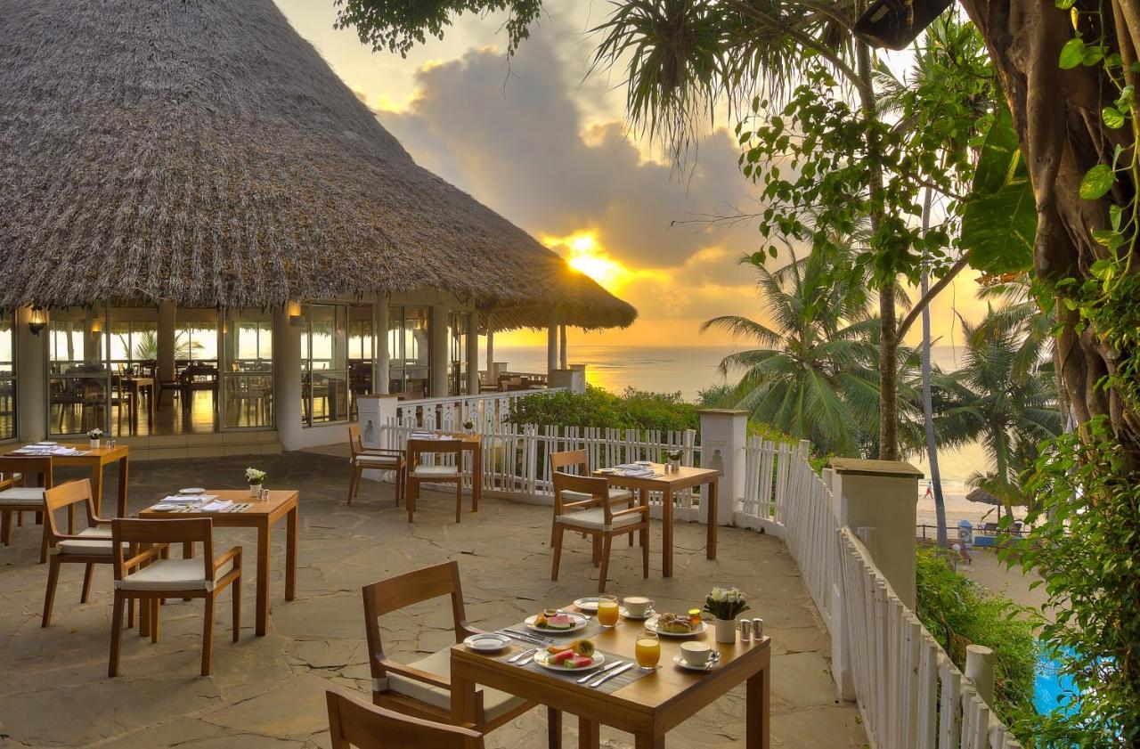 Diamonds Leisure Beach & Golf Resort Diani Beach Exterior photo Sunset at the Beach Club