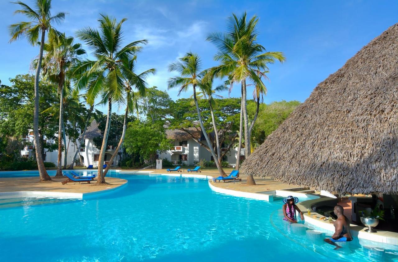 Diamonds Leisure Beach & Golf Resort Diani Beach Exterior photo The swimming pool at the hotel