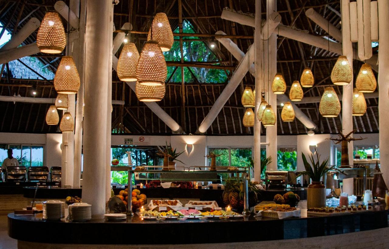 Diamonds Leisure Beach & Golf Resort Diani Beach Exterior photo The buffet at the resort