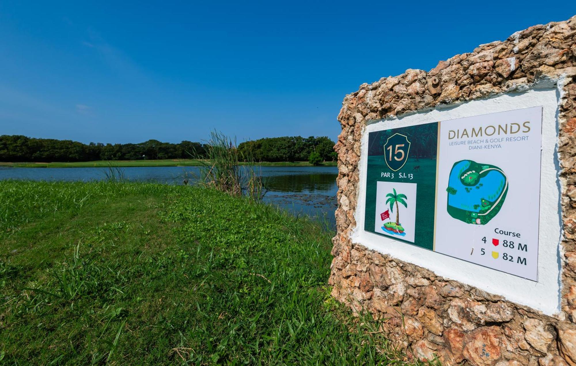 Diamonds Leisure Beach & Golf Resort Diani Beach Exterior photo Golf course sign
