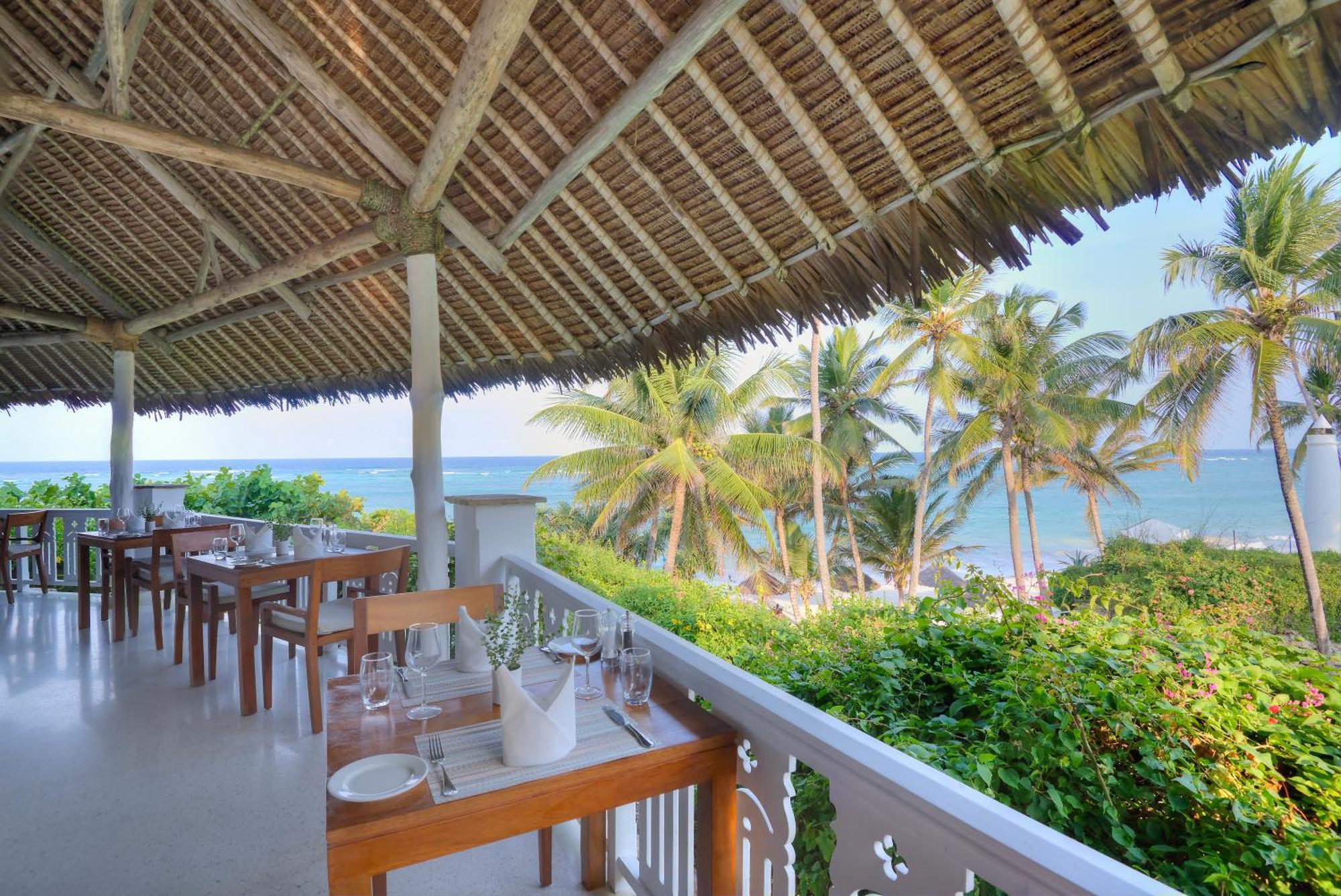 Diamonds Leisure Beach & Golf Resort Diani Beach Exterior photo The Deck Restaurant